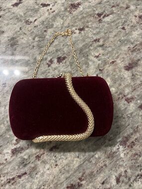 Gold-Accented Burgundy Velvet Evening Clutch with snake design